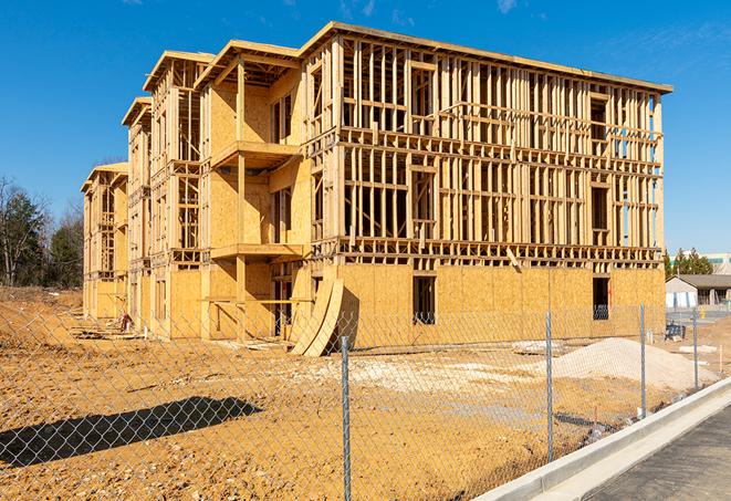 chain link fence seen from above, fencing off a large area of a building site for construction progress in Alviso, CA